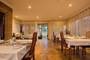 膳宿费 Centurion Golf Suites Boca Walk