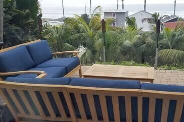 Tropical Oceanside Home W/ Deck, Walk To Beach