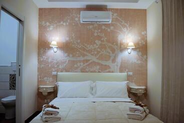 تختخواب و صبحانه La Magnolia 140