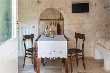تختخواب و صبحانه Trulli Del Bosco