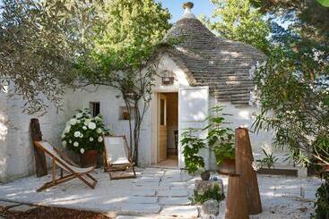 تختخواب و صبحانه Trulli Del Bosco