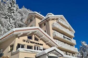 هتل Hôtel Le White Le 42 Restaurant
