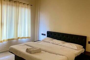 בית מלון כפרי Sandcastle Beach Resort