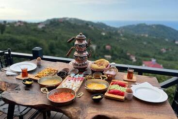 تختخواب و صبحانه Defne Bungalow Yomra