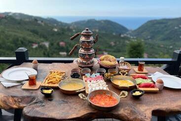 تختخواب و صبحانه Defne Bungalow Yomra
