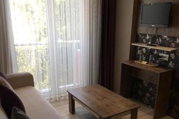 تختخواب و صبحانه Udi Suit Canakkale