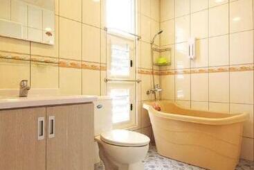تختخواب و صبحانه Jinge Guest House 集集金格民宿電動車充電站
