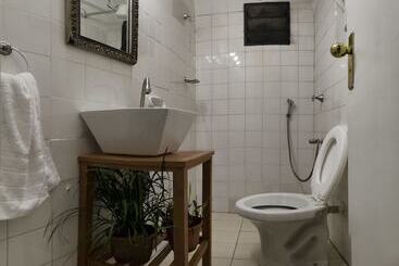 هتل Tacuari Suites