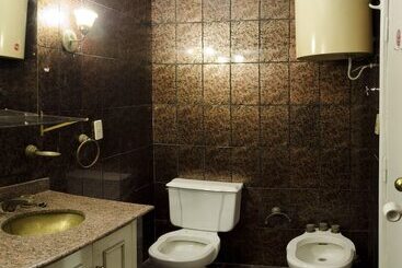 هتل Tacuari Suites