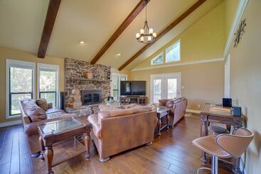 Spacious Arkansas Abode W/ Balcony & Fire Pit!