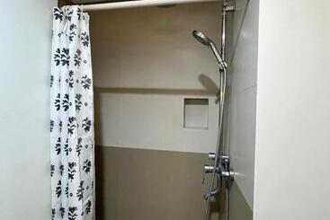 هتل Appleone Ayala Condo With Balcony