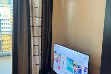 هتل Appleone Ayala Condo With Balcony