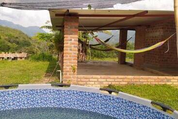 هتل Altos Del Reposo Casa Campestre