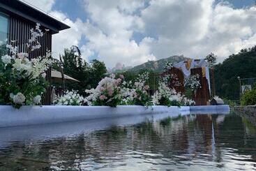 هتل Jiushui Heyuan Art Design