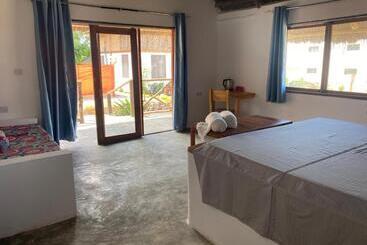 تختخواب و صبحانه Kokopelli Bungalows