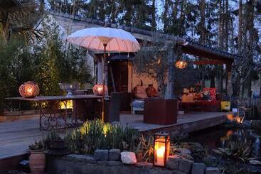 تختخواب و صبحانه De Tuinkamer