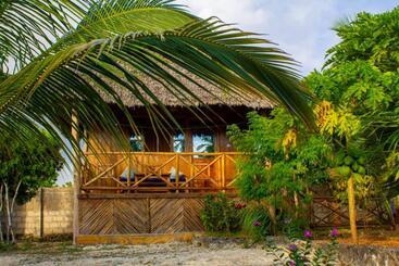 تختخواب و صبحانه Jambiani Wood House