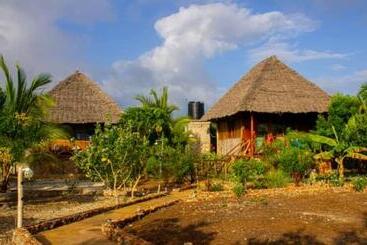تختخواب و صبحانه Jambiani Wood House