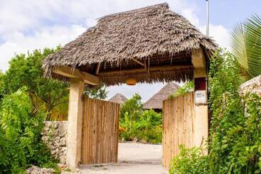 تختخواب و صبحانه Jambiani Wood House