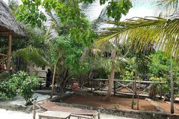 تختخواب و صبحانه Jambiani Wood House