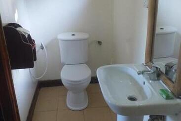 تختخواب و صبحانه Jambiani Wood House