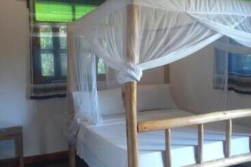 تختخواب و صبحانه Jambiani Wood House
