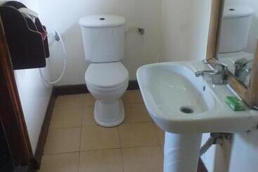 تختخواب و صبحانه Jambiani Wood House