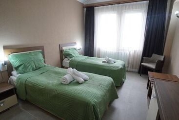 تختخواب و صبحانه Kumru Suitesseda Pansi̇yon