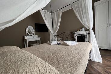تختخواب و صبحانه Casa Del Caval Bianco