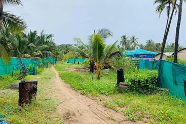 هتل Om Beach Cottages