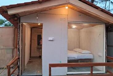 هتل Om Beach Cottages