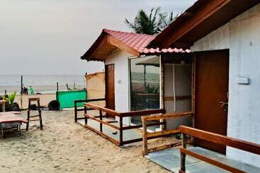 هتل Om Beach Cottages