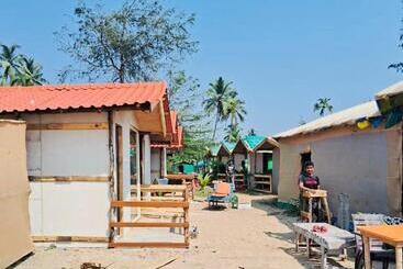 هتل Om Beach Cottages