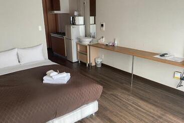 هتل Progress Inn 名護 Matabee