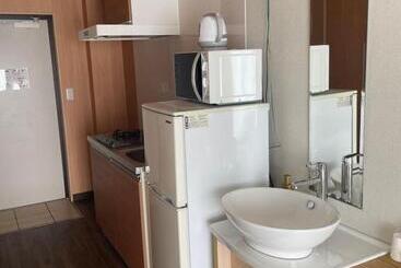 هتل Progress Inn 名護 Matabee