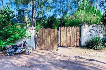 تختخواب و صبحانه Bwejuu Garden View Bungalows