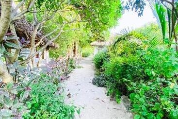 تختخواب و صبحانه Bwejuu Garden View Bungalows