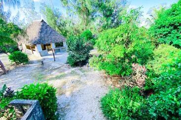تختخواب و صبحانه Bwejuu Garden View Bungalows