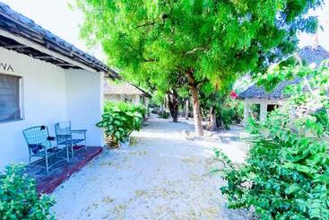 تختخواب و صبحانه Bwejuu Garden View Bungalows
