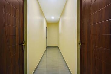 هتل Collection O Palm Inn Ac Tourist Home