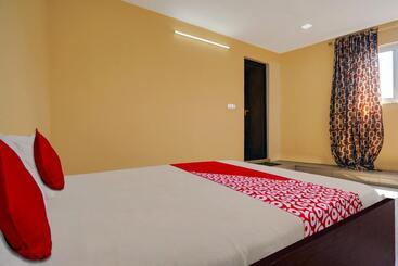 هتل Collection O Palm Inn Ac Tourist Home