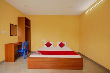 هتل Collection O Palm Inn Ac Tourist Home