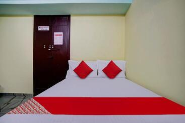 هتل Collection O Palm Inn Ac Tourist Home