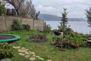تختخواب و صبحانه Buenavida Hostel, Habitación Amplia Con Baño En Suite Y Vista Al Mar