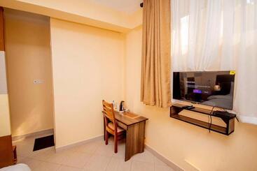 تختخواب و صبحانه Riverpoint Inn, Arusha
