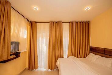 تختخواب و صبحانه Riverpoint Inn, Arusha