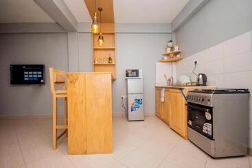 تختخواب و صبحانه Riverpoint Inn, Arusha