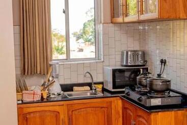 تختخواب و صبحانه Riverpoint Inn, Arusha