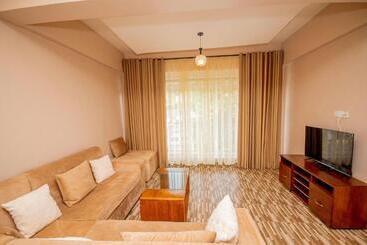 تختخواب و صبحانه Riverpoint Inn, Arusha