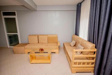 تختخواب و صبحانه Riverpoint Inn, Arusha